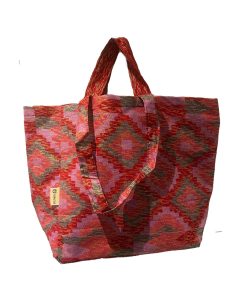 Shopper Coop inside red Kente